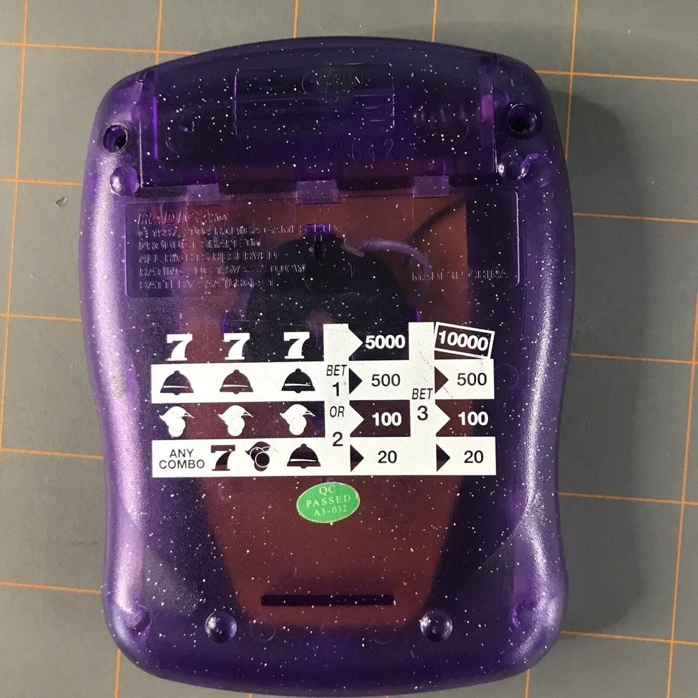 Radica 2004 Purple Pocket Electronic Handheld Game‎ Machine Game
